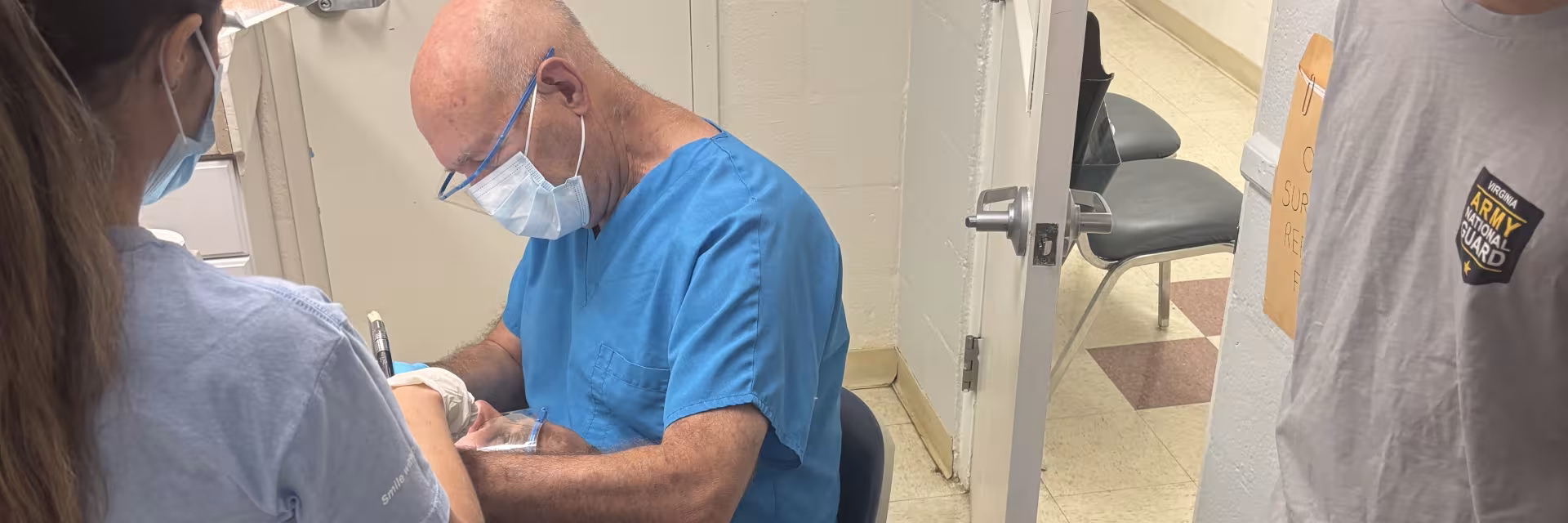 Dr. Hubbard with a Patient